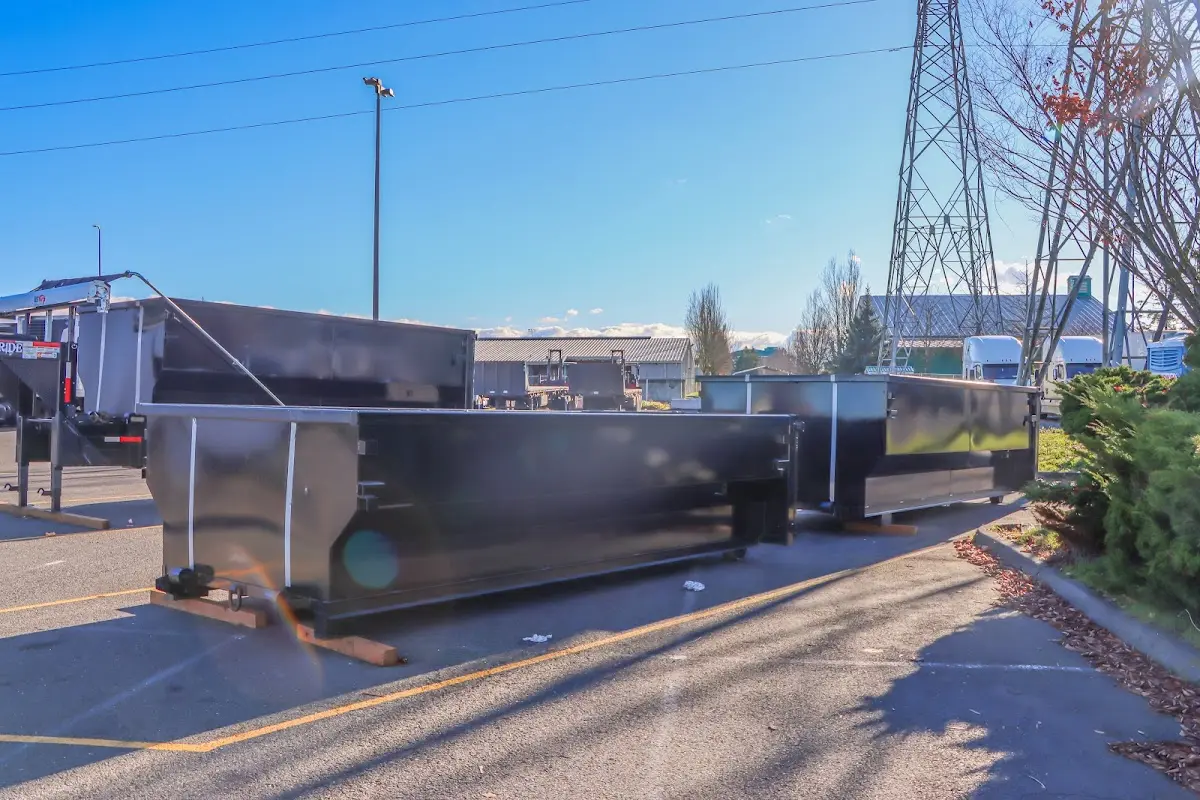 Roll-off dumpster ready for waste disposal at job site for Construction Dumpster Rental in Beaver Dam